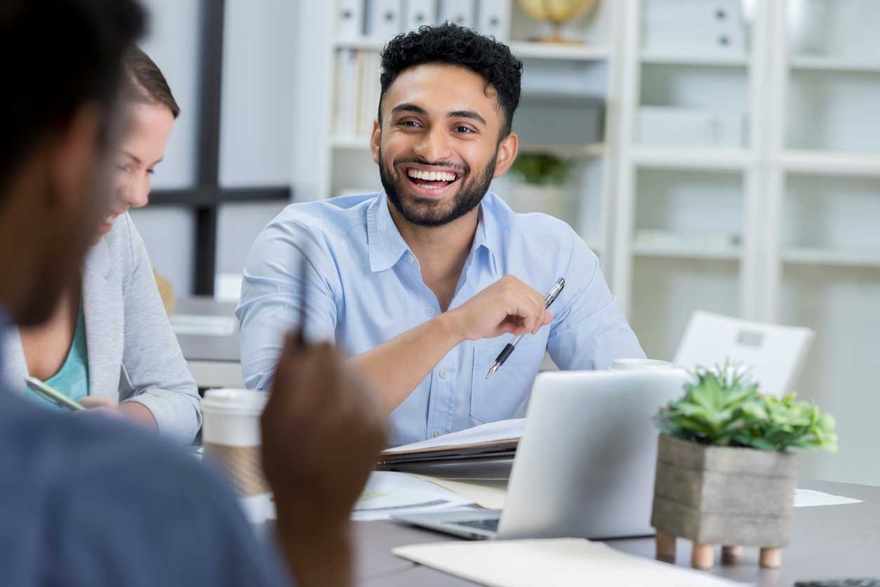 Happy employee helping client